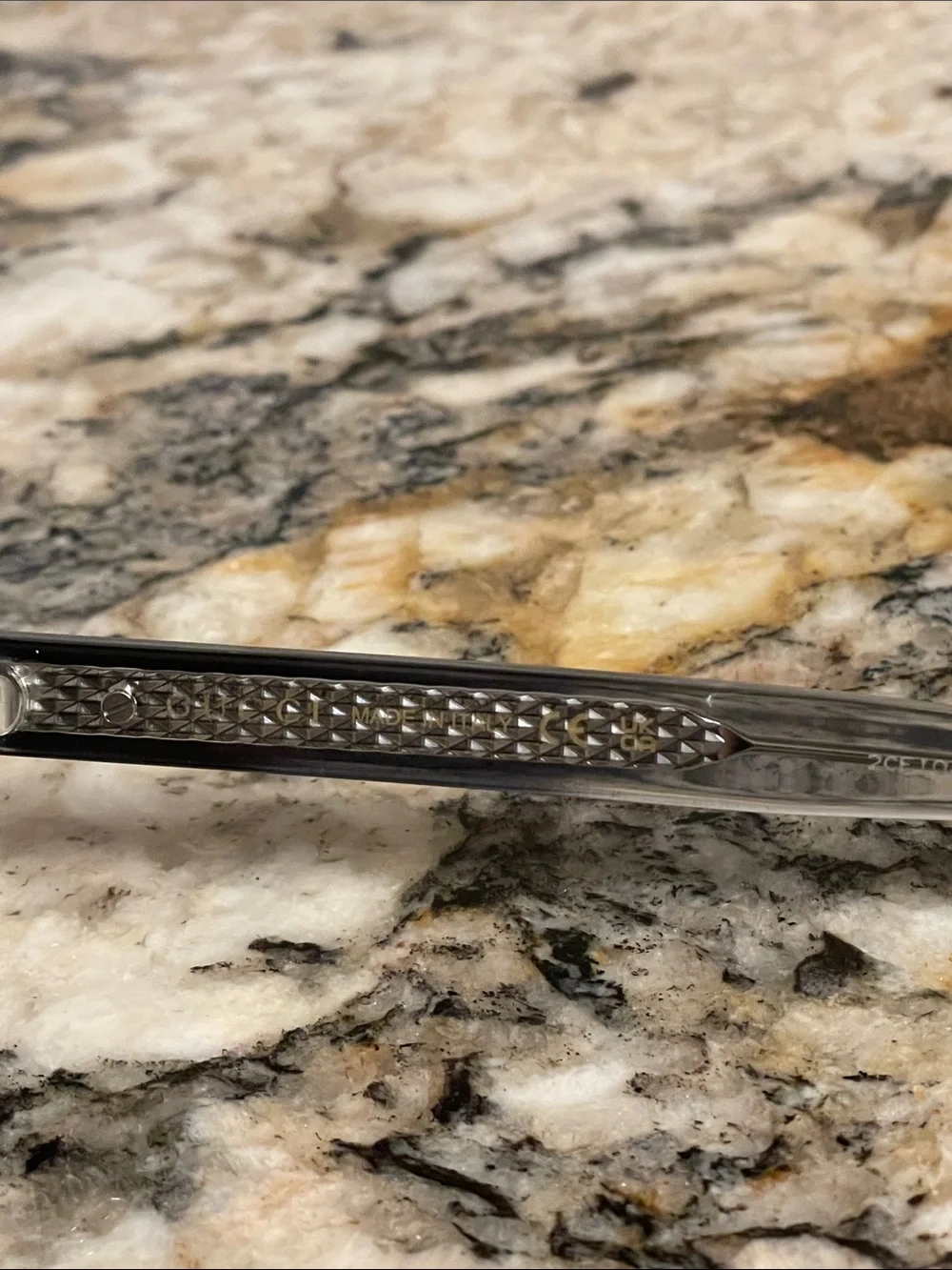 Gucci Clear Frame Sunglasses with Gray Lenses